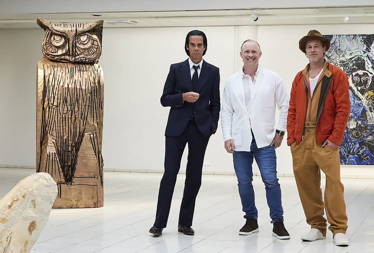 Nick Cave alongside Thomas Houseago and Brad Pitt  (SARA HILDEN ART MUSEUM/AFP via G)