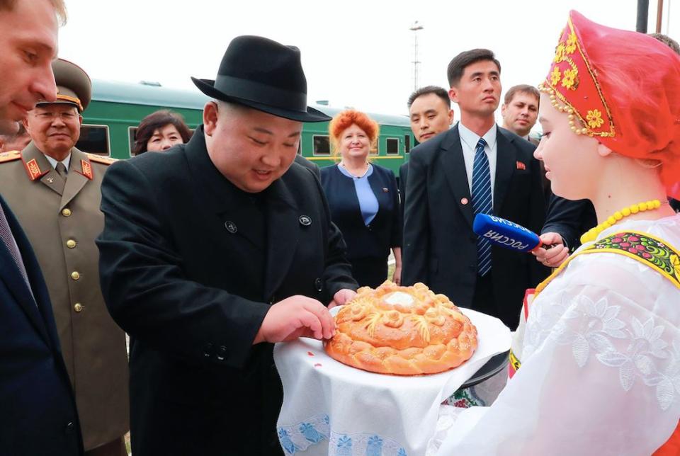 The North Korean leader received bread and salt upon his arrival at Khasan train station (AP)