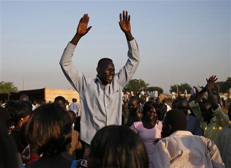 A man dances as he celebrates referendum results in Abyei October 31, 2013. REUTERS/Goran Tomasevic