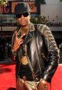 Ridiculously-dressed rapper 2 Chainz, who ironically was wearing only one chain, made sure he stood out in a pair of gold leather pants, a studded jacket, a Givenchy cap, and lots of bling. Peace!