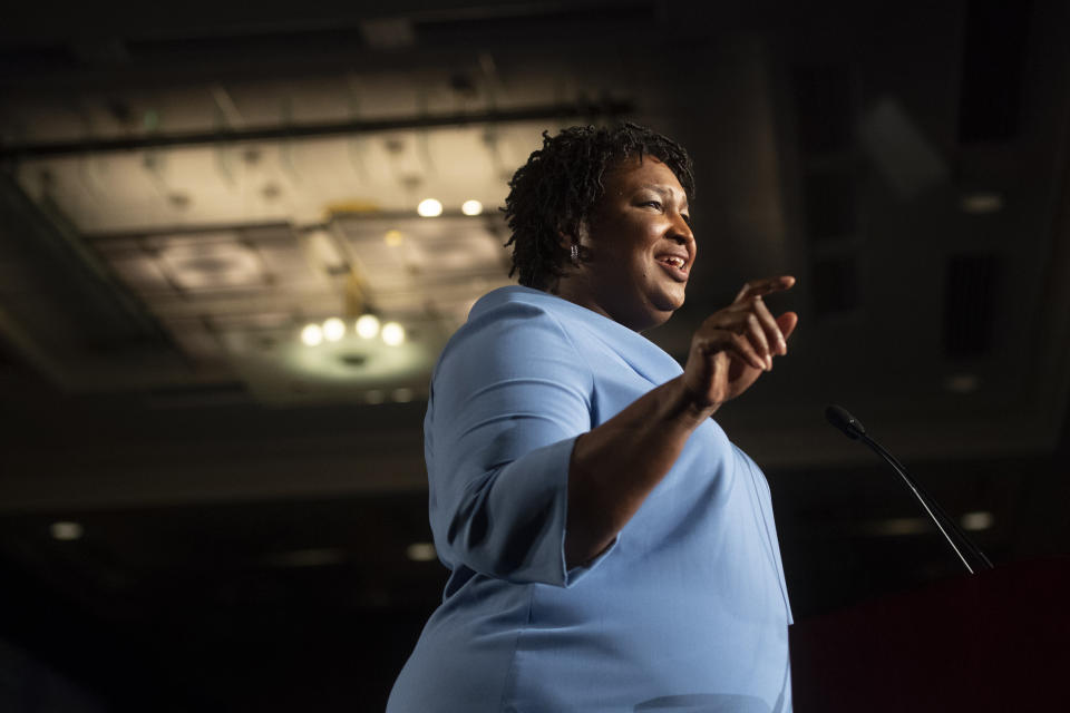 Stacey Abrams addresses supporters during an election night watch party in Atlanta on Nov. 6, 2018. (John Amis / AP file)