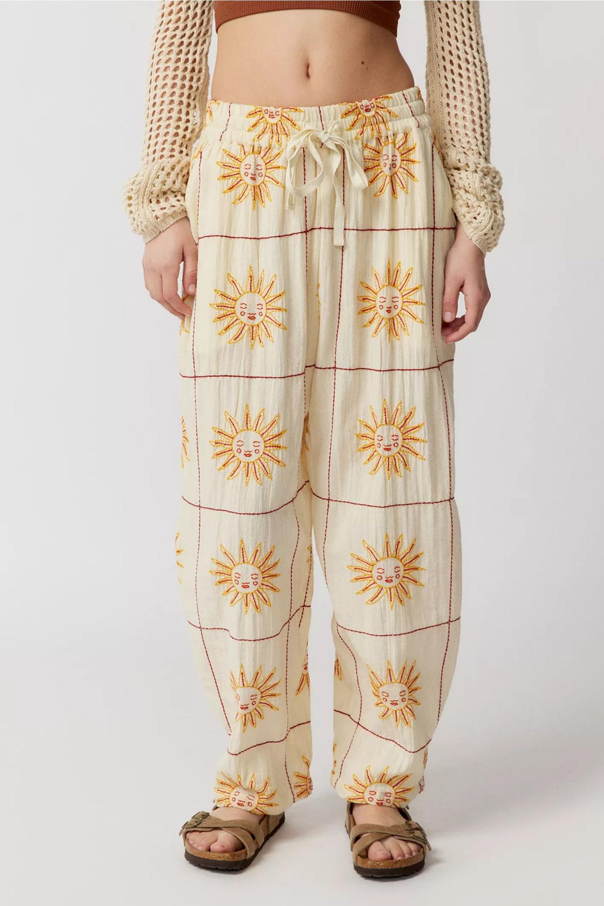 <p><a href="https://go.redirectingat.com?id=74968X1596630&url=https%3A%2F%2Fwww.urbanoutfitters.com%2Fshop%2Fuo-jay-embroidered-wide-leg-pant%3FinventoryCountry%3DUS%26color%3D012%26size%3DS%26device%3Dc%26network%3Dx%26gclid%3DCjwKCAjw1YCkBhAOEiwA5aN4AalB4u2pNDrtjMxxoLpcU1qOxNgEqjHNy-qhXJB8HnTuVp4UFRhb8hoCwX8QAvD_BwE%26gclsrc%3Daw.ds%26type%3DREGULAR%26quantity%3D1&sref=https%3A%2F%2Fwww.elle.com%2Ffashion%2Fshopping%2Fg44119015%2Fbest-summer-pants-for-women%2F" rel="nofollow noopener" target="_blank" data-ylk="slk:Shop Now;elm:context_link;itc:0;sec:content-canvas" class="link rapid-noclick-resp">Shop Now</a></p><p>Jay Embroidered Wide-Leg Pant </p><p>$79.00</p><p>urbanoutfitters.com</p>