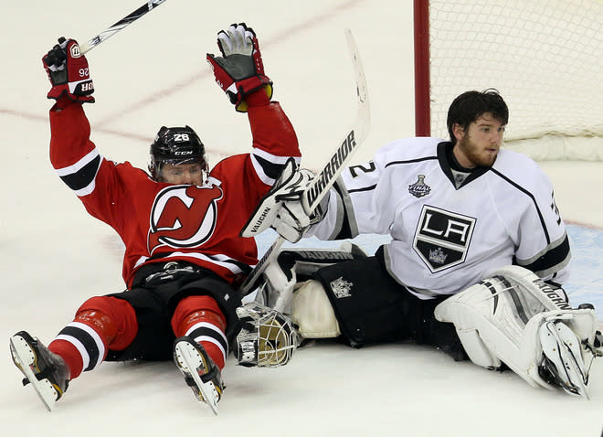 NEWARK, NJ - JUNE 02: Patrik Elias #26 of the New Jersey Devils collides with Jonathan Quick #32 of the Los Angeles Kings during Game Two of the 2012 NHL Stanley Cup Final at the Prudential Center on June 2, 2012 in Newark, New Jersey. (Photo by Jim McIsaac/Getty Images)