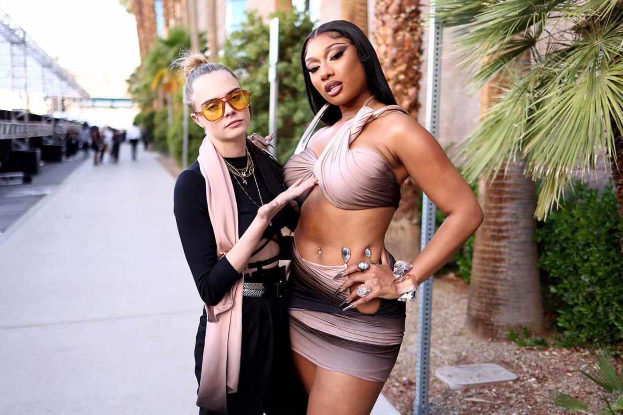 LAS VEGAS, NEVADA - MAY 15: (L-R) Cara Delevingne and Megan Thee Stallion attend the 2022 Billboard Music Awards at MGM Grand Garden Arena on May 15, 2022 in Las Vegas, Nevada. (Photo by Matt Winkelmeyer/Getty Images for MRC)