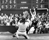 FILE - In this July 5, 1980, file photo, Sweden's Bjorn Borg falls to his knees in front of the scoreboard on the Centre Court at Wimbledon, after beating John McEnroe 1-6, 6-3, 7-5, 6-7, 8-6, to take the mens' singles final for the fifth year in a row. (AP Photo/Robert Dear, File)