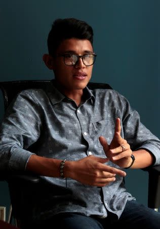 Lesther Aleman, a 20-year old student, poses for a picture at an office in Managua, Nicaragua June 23, 2018. REUTERS/Oswaldo Rivas