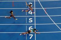 2016 Rio Olympics - Athletics - Final - Women's 400m Final - Olympic Stadium - Rio de Janeiro, Brazil - 15/08/2016. Shaunae Miller (BAH) of Bahamas throws herself across the finish line. REUTERS/Fabrizio Bensch