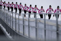 <p>Forerunners prepare the track prior to the women’s 5 km cross-country individual classic qualification competition at the 2017 Nordic Skiing World Championships in Lahti, Finland, Feb. 22, 2017. (Photo: Matthias Schrader) </p>