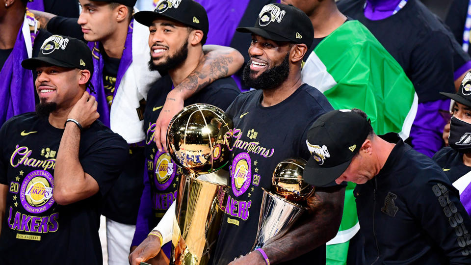 LeBron James became the first player to win NBA Finals MVP with three different teams, after he was unanimously voted as winner of the award after the Lakers defeated the Heat in game 6. (Photo by Douglas P. DeFelice/Getty Images)