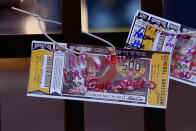 INDIANAPOLIS, IN - OCTOBER 17: Ticket stubs from the 2011 Indianapolis 500 are attacvhed to the gate at the Indianapolis Motor Speedway where other fans had left tributes to two-time Indianapolis 500 winner Dan Wheldon on October 17, 2011 in Indianapolis, Indiana. Wheldon, winner of the 2011 Indy 500, was killed in a crash yesterday at the Izod IndyCar series season finale at Las Vegas Motor Speedway. (Photo by Scott Olson/Getty Images)