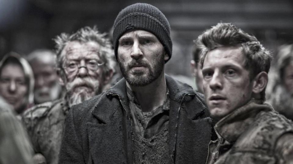 (L-R) John Hurt as Gilliam, Chris Evans as Curtis Everett and Jamie Bell as Edgar in Snowpiercer