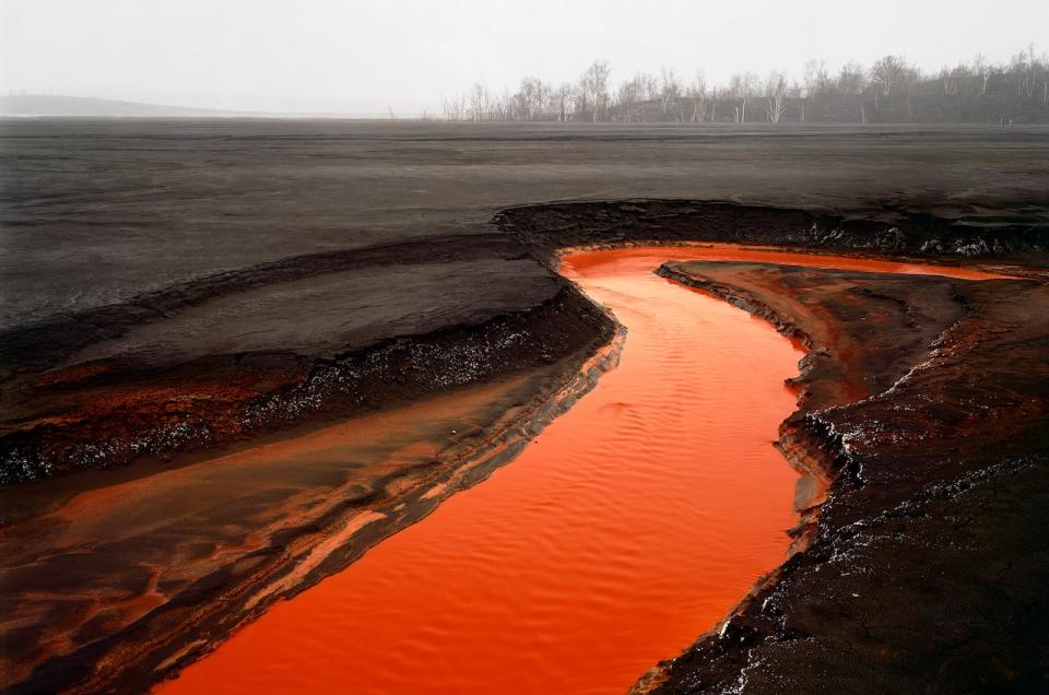 Captured by Burtynsky in 1996, this photograph shows the nickel tailings just outside of Sudbury, Ontario, one of the most mineral-rich areas in the world.