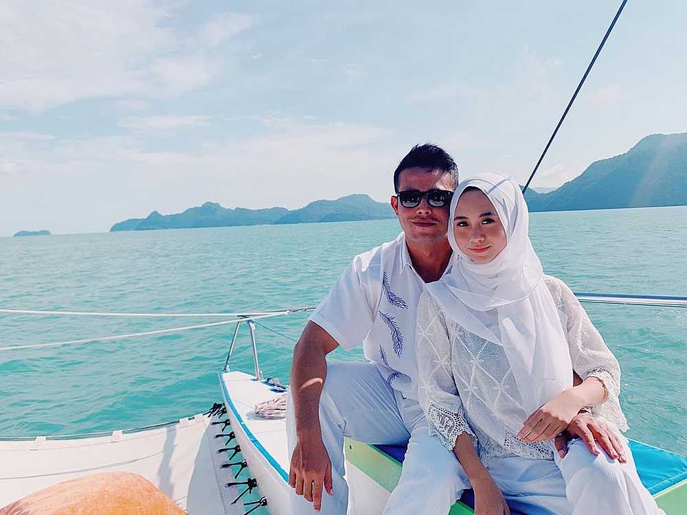 File photo showing Intan Najuwa and her co-star Zul Ariffin during a boat ride in Langkawi. The actress' fiance has denied his relationship with his wife-to-be was on the rocks. — Picture via Instagram/ intannajuwa