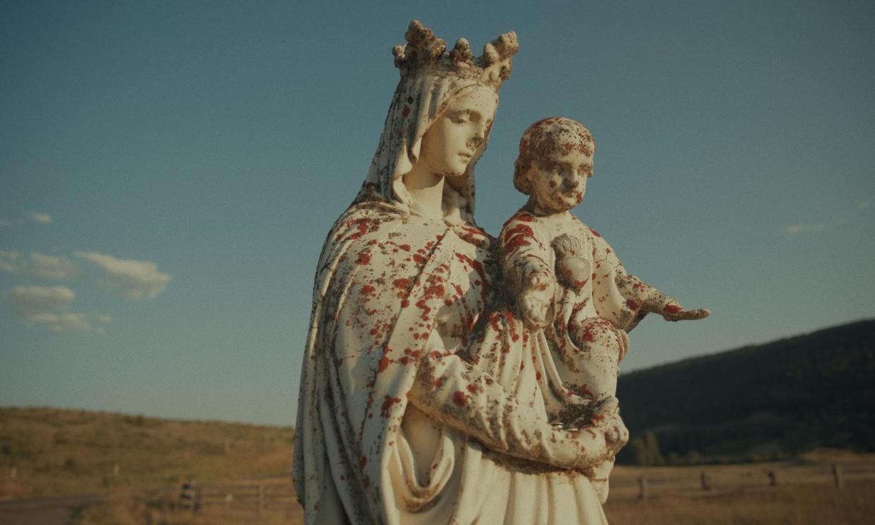 <span>Stain on the landscape … a statue of Mary and Baby Jesus looks over St Joseph's Mission, a former residential school for Indigenous children in British Columbia.</span><span>Photograph: Christopher LaMarca/Sugarcane Film LLC</span>