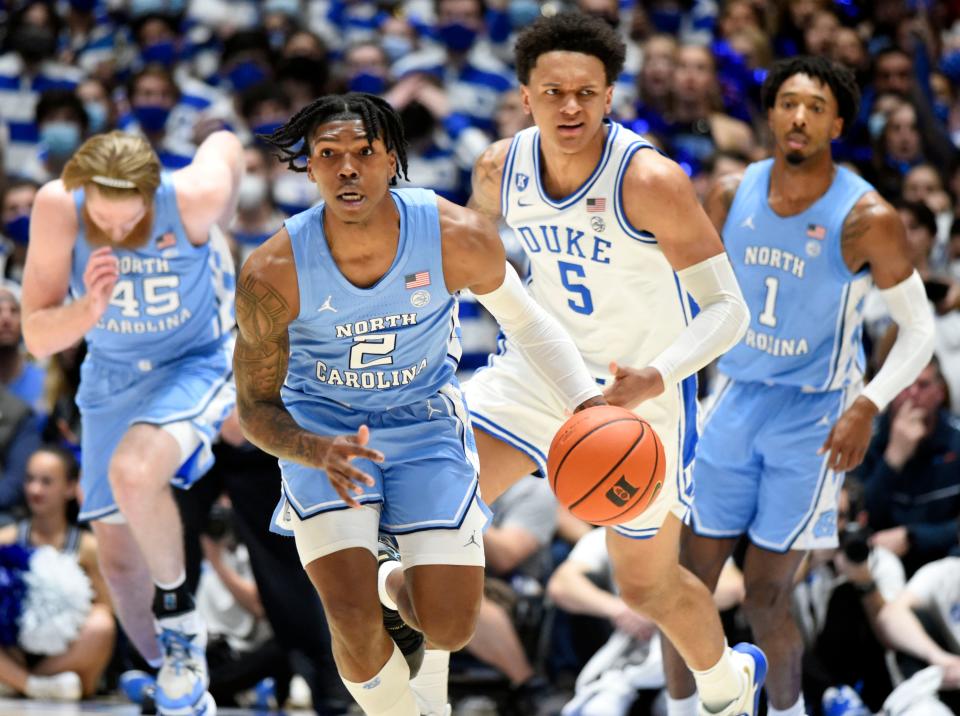 Mar 5, 2022; Durham, North Carolina, USA; North Carolina Tar Heels guard Caleb Love (2) dribbles the ball up court during the first half against the Duke Blue Devils at Cameron Indoor Stadium.