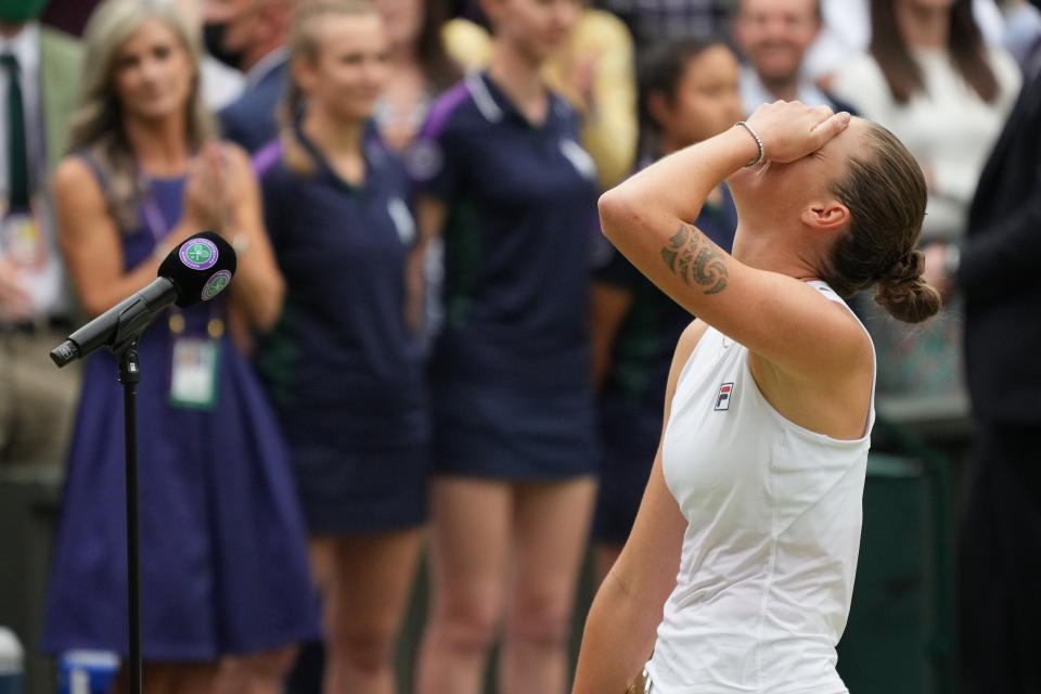 Czech Republic's Karolina Pliskova reacts after winning runners up during the presentation ceremony after her defeat bye Australia's Ashleigh Barty in the women's singles final on day twelve of the Wimbledon Tennis Championships in London, Saturday, July 10, 2021. (AP Photo/Alberto Pezzali)