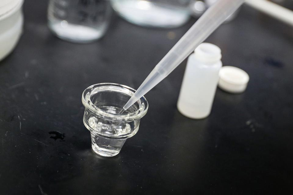 A water sample is tested for lead Thursday, June 3, 2021, at the school's engineering, science and technology building in Indianapolis. IUPUI is testing for lead in area homes, free of charge. 