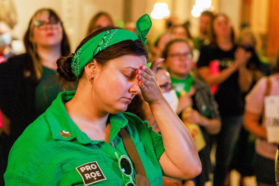 Mandatory Credit: Photo by Jeremy Hogan/SOPA Images/Shutterstock (13071550o) Abortion rights activists react after the Indiana Senate votes to ban abortion, inside the Indiana State house during a special session in Indianapolis. The legislature held a special session to ban abortion rights in the wake of the U.S. Supreme Court ruling overturning Roe v. Wade in June. Holcomb signed the bill into law. Indiana becomes first state post-Roe to pass law banning most abortions - 05 Aug 2022