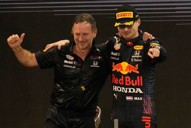 Christian Horner (left) celebrates with Max Verstappen