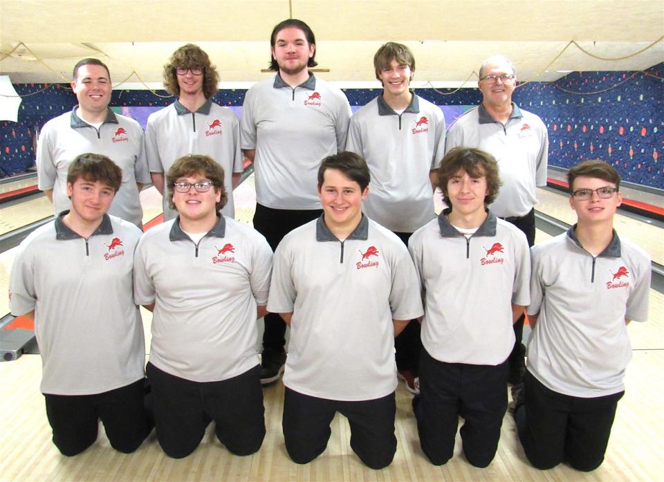 Members of the 2021-22 Minerva boys bowling team are (front row, left to right) Michael May, Ahdyn Lautzenheiser, Nicholas Baumgardner, Isaiah Frazier and Dylan Bias; and (back row) Head Coach Nick Embrogno, Cameron Mayle, Lloyd Grate, Isaac Wisenbarger and Coach Gary Cress.