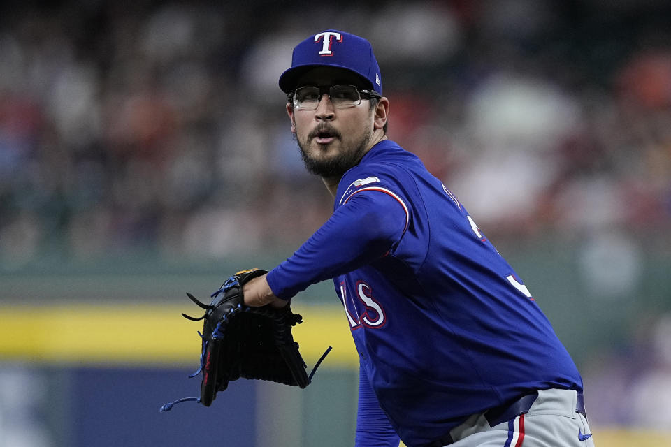 Texas Rangers starting pitcher Dane Dunning delivers during the first inning of a baseball game against the Houston Astros Friday, April 12, 2024, in Houston. (AP Photo/Kevin M. Cox)