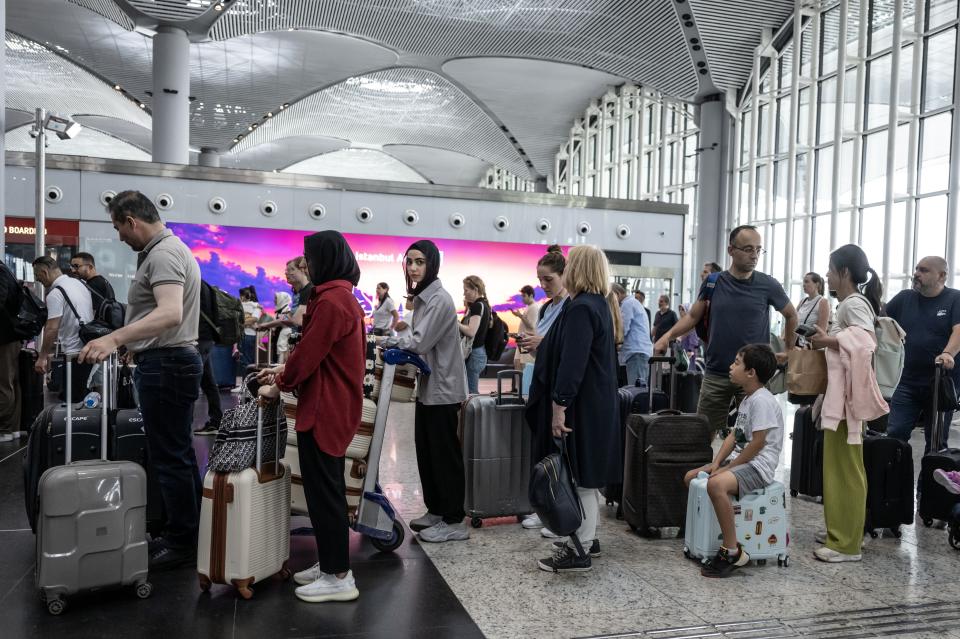 ISTANBUL, TURKIYE - JUNE 14: A view of international departures terminal at Istanbul Airport during the rush ahead of Eid al-Adha in Istanbul, Turkiye on June 14, 2024. Istanbul's airports have a busy schedule due to eid holiday, with 1608 flights from Istanbul Airport and 743 flights from Sabiha Gokcen Airport. (Photo by Sebnem Coskun/Anadolu via Getty Images)