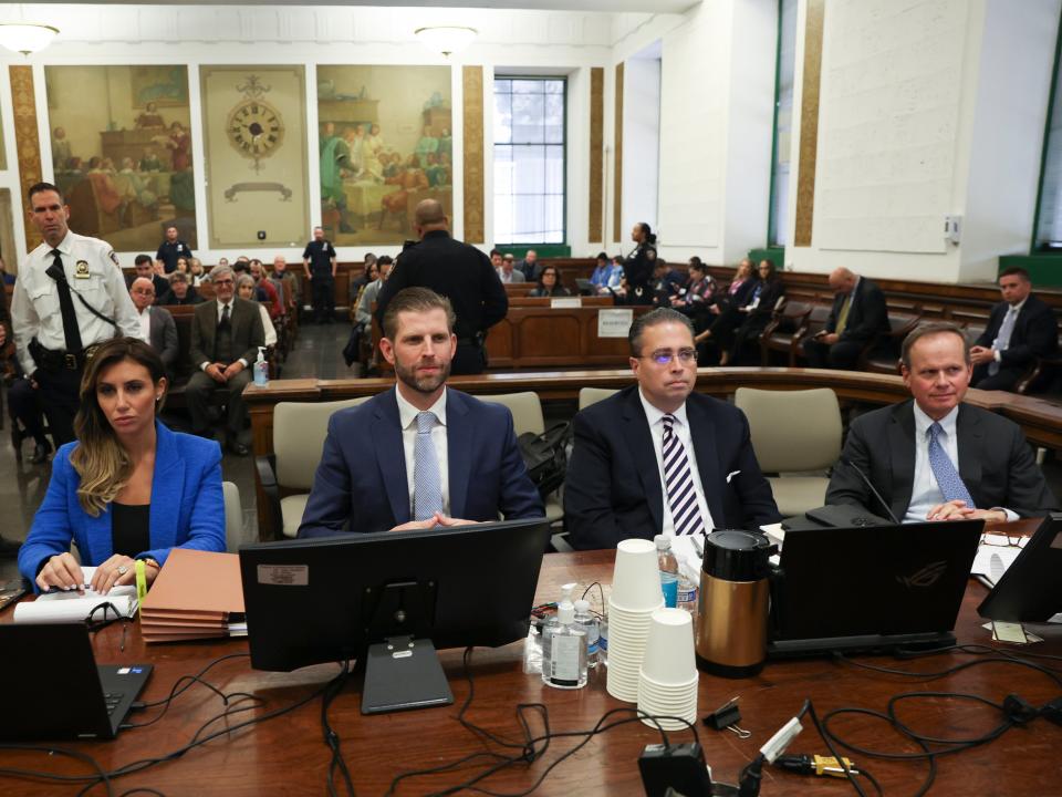 Former President Donald Trump’s son and co-defendant Eric Trump, second from left, and lawyers, from left, Alina Habba, Clifford Robert and Christopher Kise attend the Trump Organization's civil fraud trial (AP)