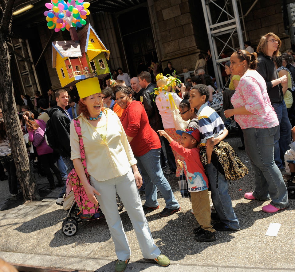 NEW YORK, NY - APRIL 24: Parade goers admire an ornate bonnet during the 2011 Easter parade and Easter bonnet festival on the Streets of Manhattan on April 24, 2011 in New York City. (Photo by Jemal Countess/Getty Images)