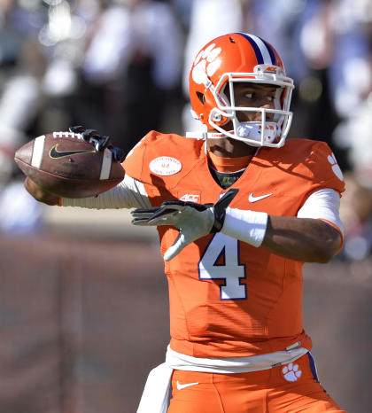 Clemson quarterback Deshaun Watson throws the ball during warm ups before the start of an NCAA college football game against South Carolina, Saturday, Nov. 29, 2014, in Clemson, S.C. (AP Photo/Richard Shiro)