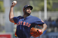 Houston Astros pitcher Josh James delivers to the Boston Red Sox during a spring training baseball game, Thursday, March 5, 2020, in Fort Myers, Fla. (AP Photo/Elise Amendola)