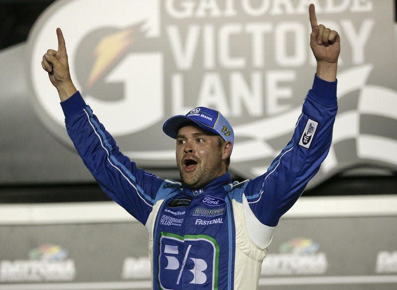 Ricky Stenhouse Jr. celebrates in Victory Lane after winning a NASCAR Cup auto race at Daytona International Speedway, in Daytona Beach, Fla., in July 2017.