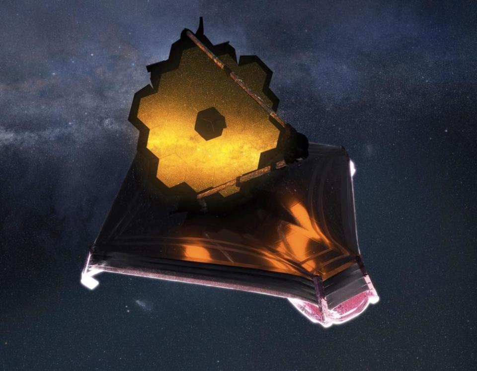 An artist's impression of the James Webb Space Telescope, with its gold-coated segmented mirror and its tennis court-size sunshade, orbiting the sun a million miles from Earth. / Credit: NASA