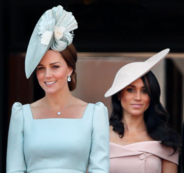 LONDON, UNITED KINGDOM – JUNE 09: (EMBARGOED FOR PUBLICATION IN UK NEWSPAPERS UNTIL 24 HOURS AFTER CREATE DATE AND TIME) Catherine, Duchess of Cambridge and Meghan, Duchess of Sussex stand on the balcony of Buckingham Palace during Trooping The Colour 2018 on June 9, 2018 in London, England. The annual ceremony involving over 1400 guardsmen and cavalry, is believed to have first been performed during the reign of King Charles II. The parade marks the official birthday of the Sovereign, even though the Queen’s actual birthday is on April 21st. (Photo by Max Mumby/Indigo/Getty Images)