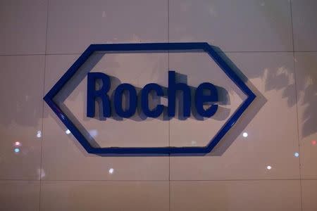 The logo of Swiss pharmaceutical company Roche is seen outside the Shanghai Roche Pharmaceutical Co. Ltd. headquarters in Shanghai May 22, 2014. REUTERS/Aly Song