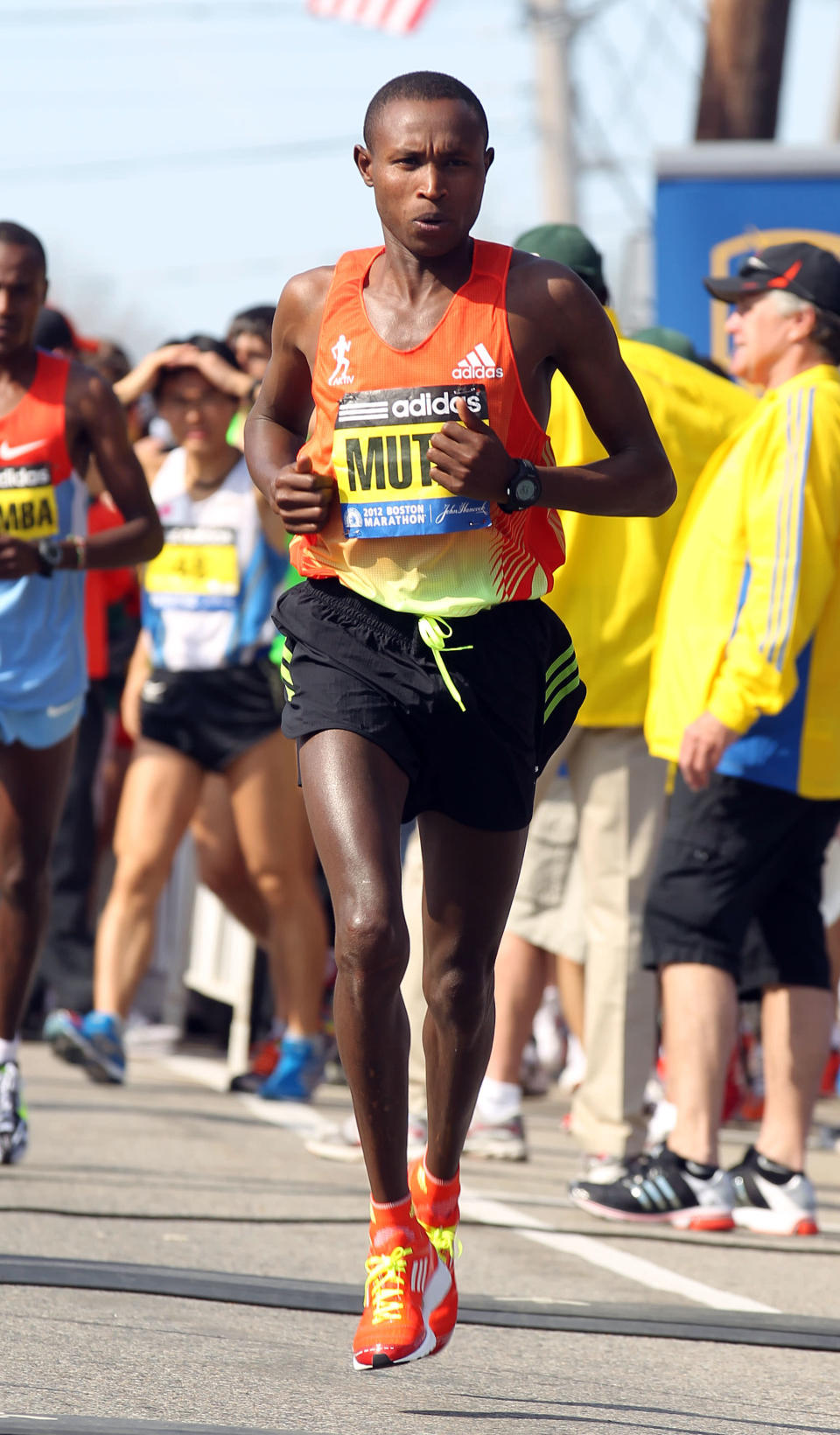 Geoffrey Mutai, of Kenya, warms up prior to the start of the 116th running of the Boston Marathon, in Hopkinton, Mass., Monday, April 16, 2012. (AP Photo/Stew Milne)