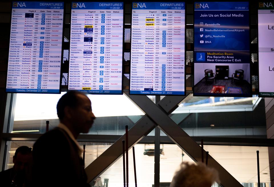 Screens at the Nashville International Airport show several canceled and delayed flights Tuesday.