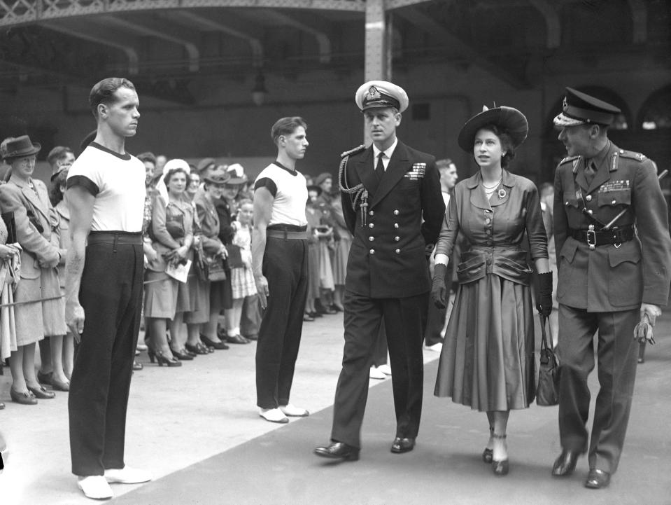 The Royal Couple inspect the PT Guard of Honour at the Royal Tournament at Olympia. The tournament was a major military tattoo and pageant and was first held in 1880, and was axed in 1999 as part of a cost-cutting exercise.