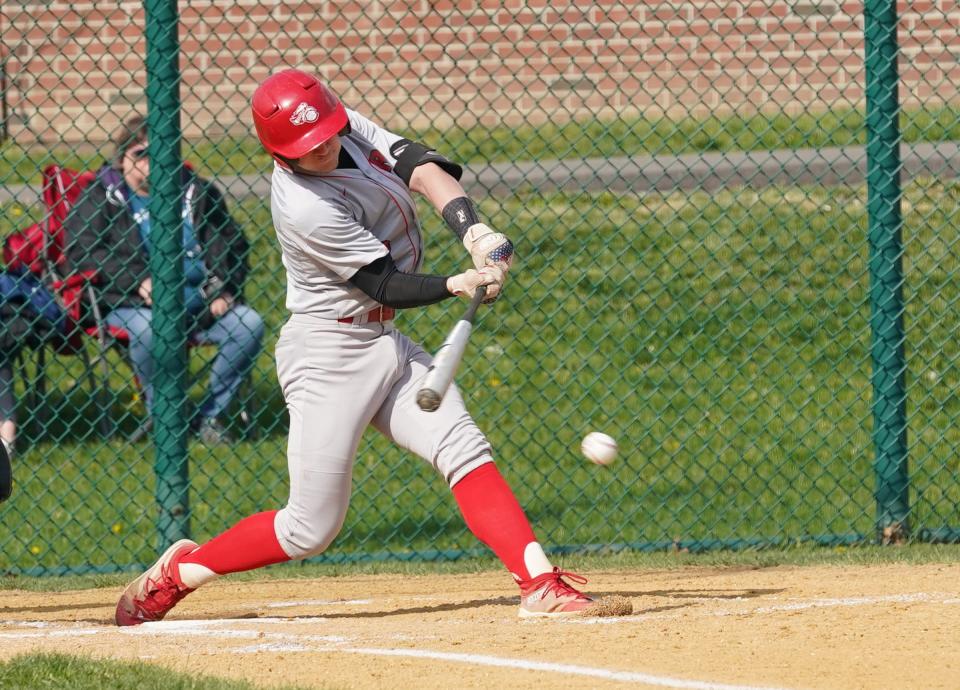 Red Hook's Jack Neese (2) connects with a pitch 7-1 in baseball action against New Paltz at New Paltz High School on Wednesday, April 26, 2023.  New Paltz won 7-1.