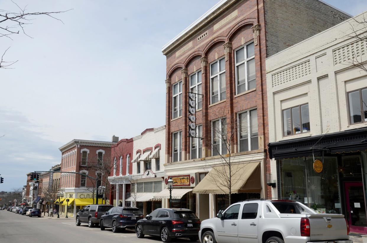 Businesses on Lake Street in downtown Petoskey are shown.