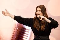 Tony winner Idina Menzel gets into the holiday spirit on Thursday, performing songs from her new album, <i>Christmas: A Season of Love</i>, at a Today at Apple event at the Fifth Avenue Apple Store in New York City.