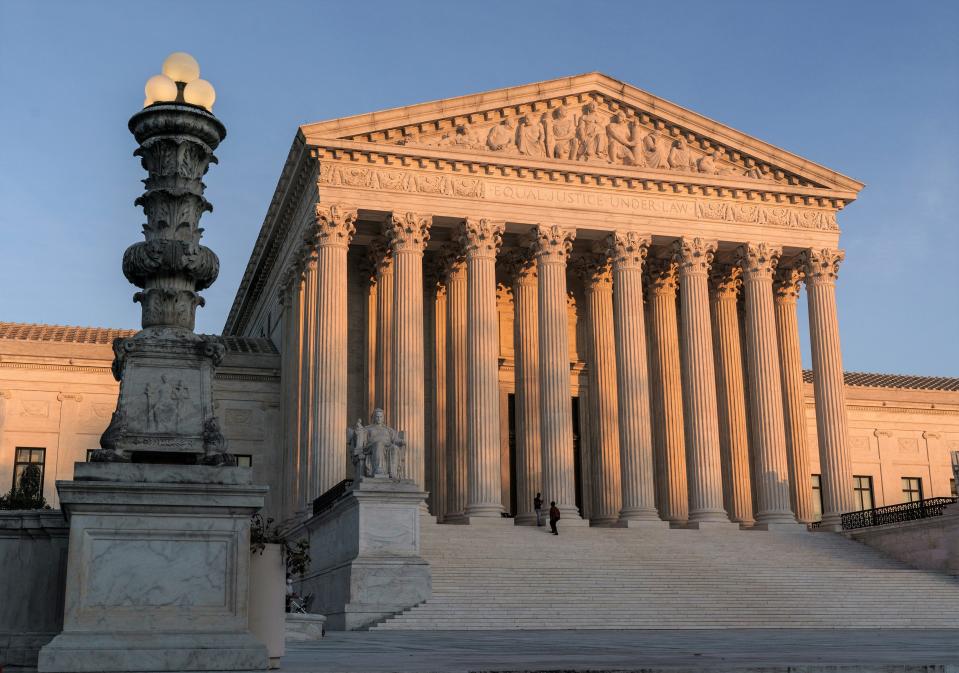 FILE - In this Nov. 6, 2020, file photo, the Supreme Court is seen at sundown in Washington. The Supreme Court is telling California that it can't enforce coronavirus-related restrictions that have limited home-based religious worship including Bible studies and prayer meetings.The order from the court late Friday, April 9, 2021, is the latest in a recent string of cases in which the high court has barred officials from enforcing some coronavirus-related restrictions applying to religious gatherings.