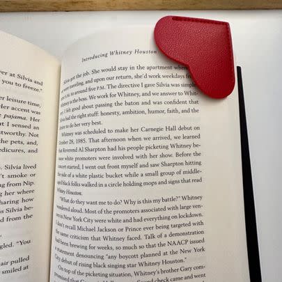 A set of six heart-shaped faux leather bookmarks