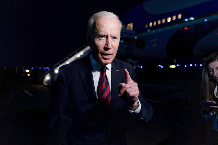 President Joe Biden talks to reporters before he boards Air Force One at Cincinnati/Northern Kentucky International Airport in Hebron, Ky., Wednesday, July 21, 2021, to travel back to Washington after speaking at a CNN town hall in Cincinnati. (AP Photo/Andrew Harnik)