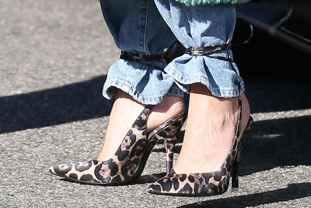 Chrissy Teigen Goes Wild for Leopard-Print Pumps With a Cozy Green Coat