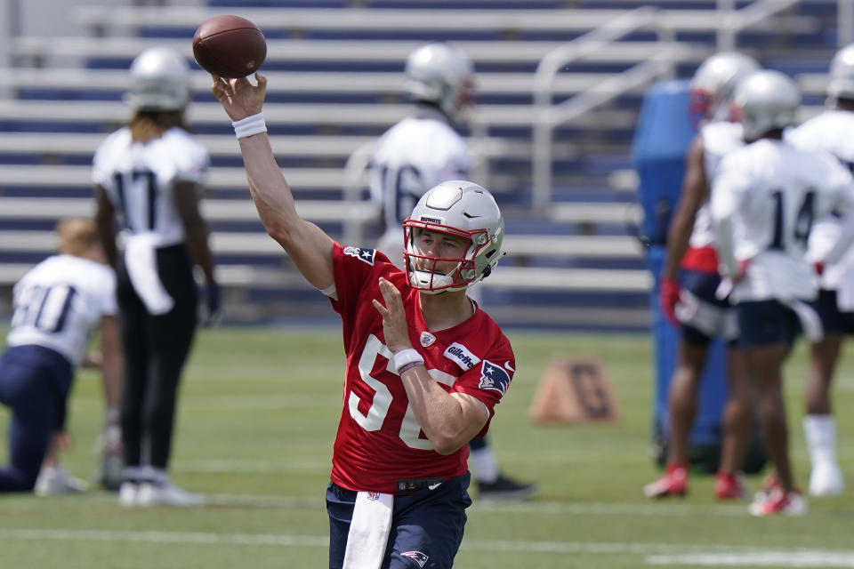 New England Patriots quarterback Mac Jones passes the ball during an NFL football practice, in Foxborough, Mass., Thursday, June 10, 2021. (AP Photo/Steven Senne)