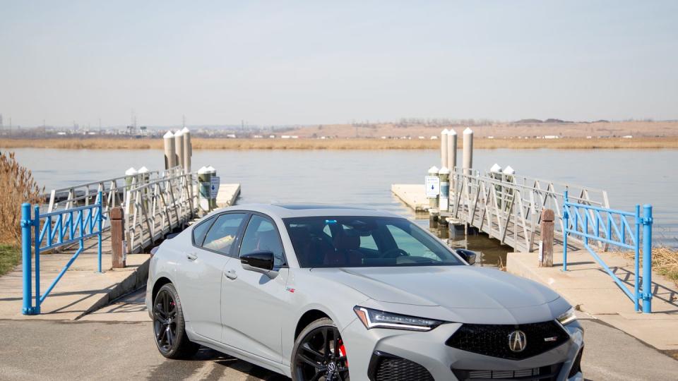 front three quarter view of a gray 2024 acura tlx type s sedan parked on a boat ramp