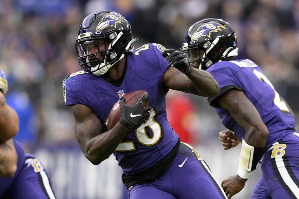 Baltimore Ravens running back Latavius Murray in action.