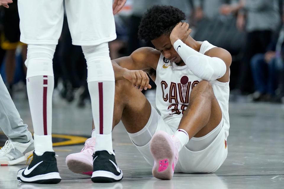 Cleveland Cavaliers forward Isaac Okoro reacts after Golden State Warriors guard Stephen Curry made a 3-pointer during the second half in San Francisco, Friday, Nov. 11, 2022.