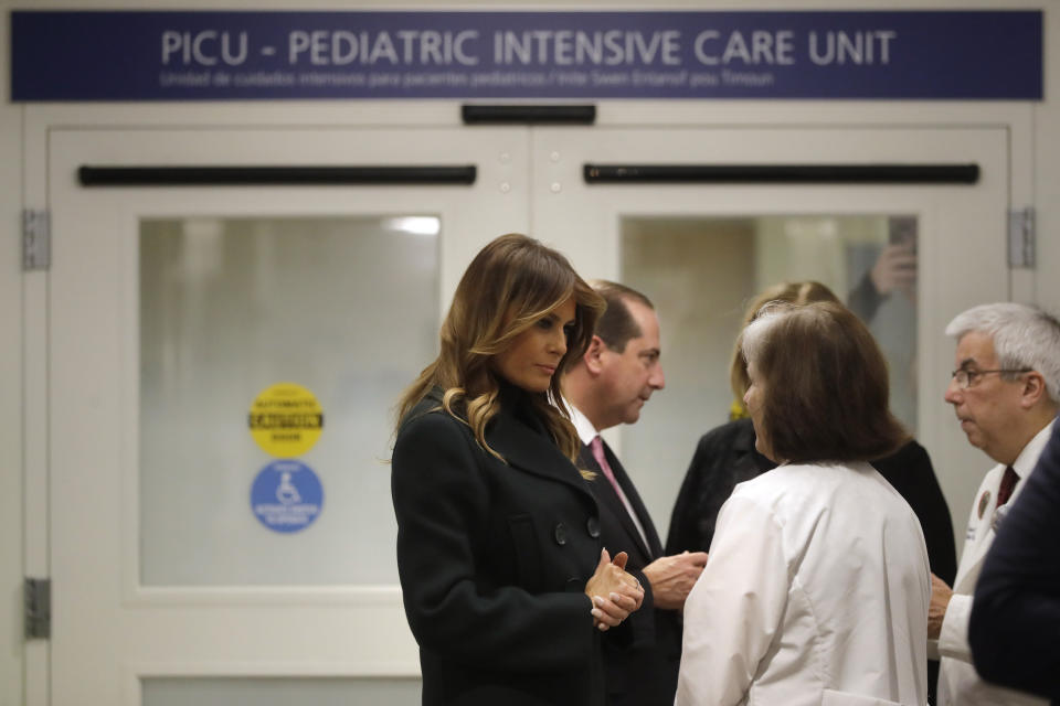 First lady Melania Trump, left, speaks with pediatrician Eileen Costello, front right, as U.S. Secretary of Health and Human Services Alex Azar, behind center, and Chief of Pediatrics Bob Vinci, right, look on during a visit to Boston Medical Center, in Boston, Wednesday, Nov. 6, 2019. The visit, part of the first lady's "Be Best" initiative, included the hospital's pediatric intensive care unit. (AP Photo/Steven Senne, Pool)