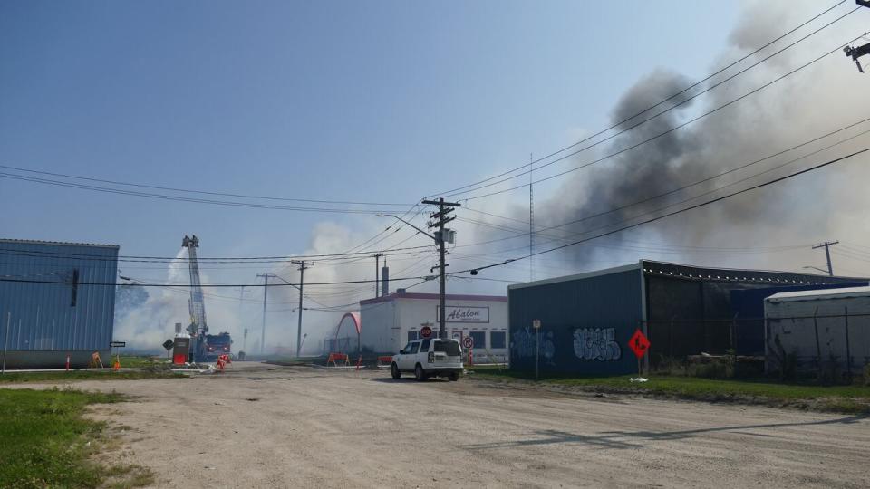 Winnipeg Fire Paramedic District Chief John Senkowski said the humidity and wind speed are keeping the smoke low in the area.